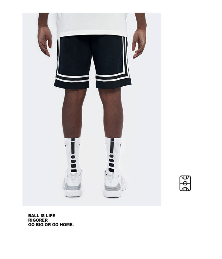 Rigorer knitted Bermuda basketball shorts in black, front view with white side tape